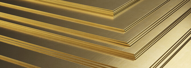 Stack of brass sheets. Rolled metal product, close-up.