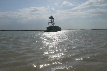 Reflejo del sol en el agua
