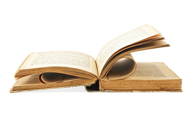 Open hardcover old book isolated on a white background