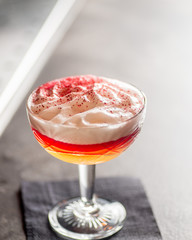 beautiful finished pink cocktail at the bar