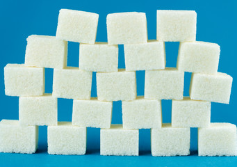 sugar cubes on a blue background