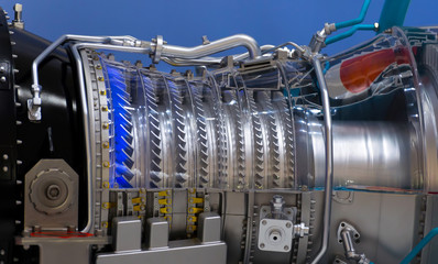 Plane engine element. Turbine blades. Blue light - obrazy, fototapety, plakaty