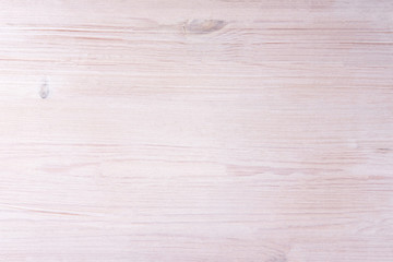 Light painted wooden texture background top view.