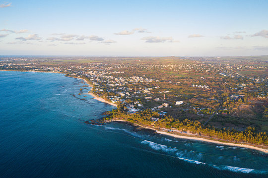 Aerial by drone of tropical beach of Pointe Aux Biches, Trou Aux Biches and Mont Choisy, north-west coast, Mauritius