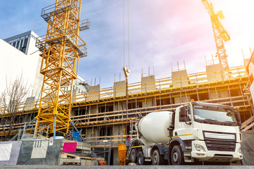 Commercial or residential corporate hightower building construction site with different heavy...