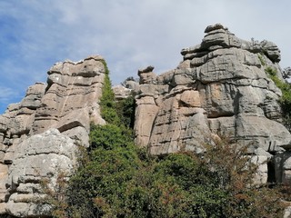 Fototapeta na wymiar Paisaje con rocas Parque Nacional El Torcal, Torcal de Antequera, provincia de Málaga, Andalucía, España