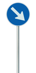 Mandatory keep right European Union EU road sign on pole post, large blue round isolated traffic...
