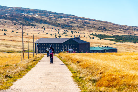 Tourists at Lucni Bouda on sunny autumn day in Giant Mountains, Krkonose National Park, Czech Republic
