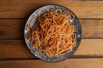 plate of spaghetti pasta with tomato