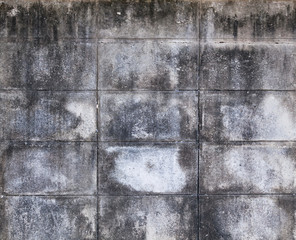 aged rough mossy textured concrete block fence wall background. Exterior, Backdrop, Decoration, Architectural House Home Design concept use in Outdoor Building Construction and Architecture Industry.