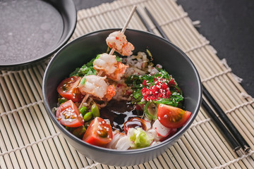 Close up fried rice with vegetables, beans and shrimp. Asian food.