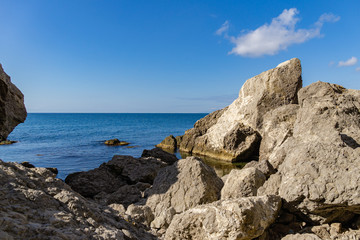 Fototapeta na wymiar Scenic landscape with rocky coast of the Black Sea in surroundings of Sudak, Crimean peninsula. Cape Alchak in Sudak, Crimea