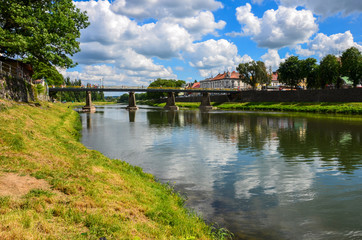 Fototapeta premium View of bridge on river Uzh at city Uzhgorod, Transcarpathia, Ukraine Europe