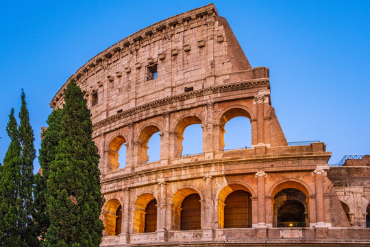 Rome, Italy - External walls of the ancient roman Colosseum - Colosseo - known also as Flavian amphitheater - Anfiteatro Flavio - in an evening light