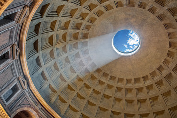 Fototapety  Rome, Italy - Interior of Roman Pantheon ancient temple, presently catholic Basilica, with its characteristic dome with an oculus and famous daylight beam