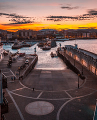 Fototapeta premium San Sebastian, Gipuzkoa / Spain »; February 2, 2020: First orange lights of dawn in San Sebastian, Basque Country