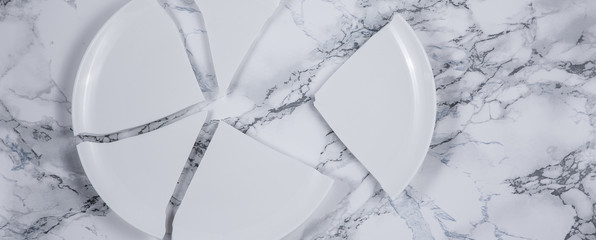 Broken Plate or broken  glass on the on the floor in the kitchen The concept of accidents in the...