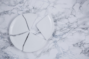 Broken Plate or broken  glass on the on the floor in the kitchen The concept of accidents in the...