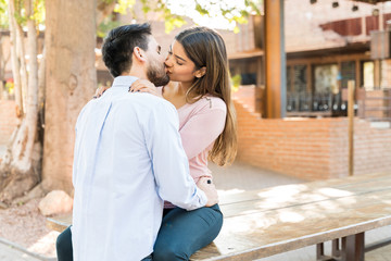 Passionate Hispanic Couple Kissing