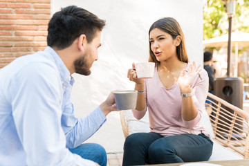 Boyfriend And Girlfriend Are At Cafe During Date