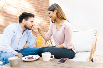 Romantic Couple Enjoying Date At Cafe