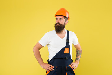 Man builder hard hat. Creativity and practice. Major renovation places strong emphasis natural materials and sustainability. Improvement and renovation. Brutal man builder. Engineer builder uniform