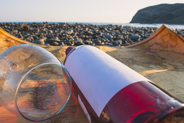 Bottle of wine on the beach