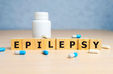 EPILEPSY word on wooden cubes, background. Concept of epilepsy awareness.