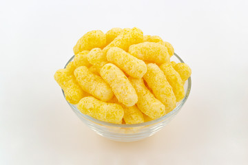 Corn sticks close-up on a white background