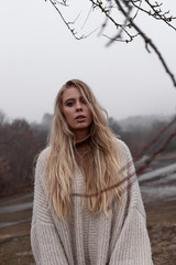  Girl with long hair for a walk in the fall