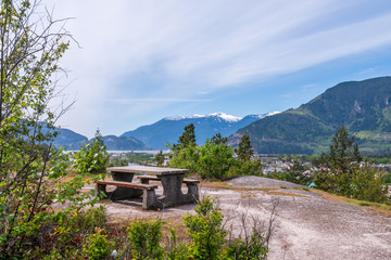 Picnic Table in Park with mountain  background.
