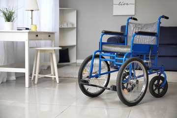 Fototapeta na wymiar Modern empty wheelchair in room