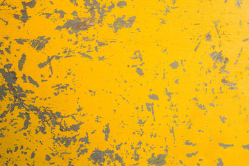worn yellow wooden board