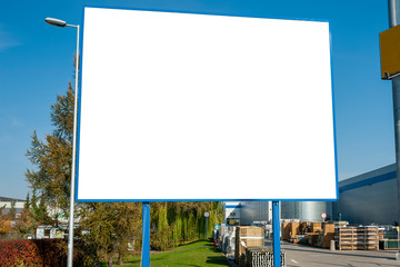 Blank white billboard for advertisement in the front of the warehouse building