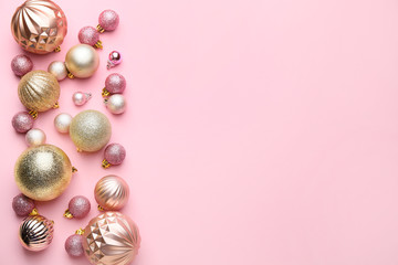Beautiful Christmas balls on pink background