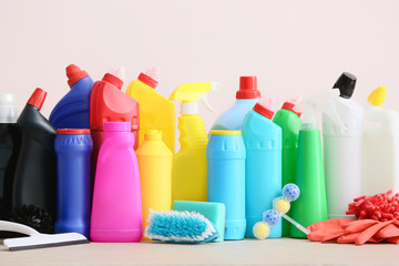 Set of cleaning supplies on light background