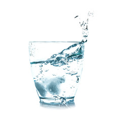 Glass of fresh water with splash on white background