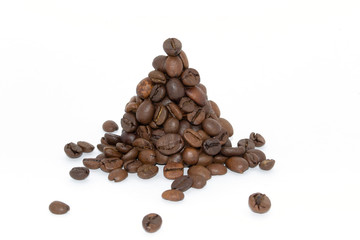 hill of coffe beans on white background