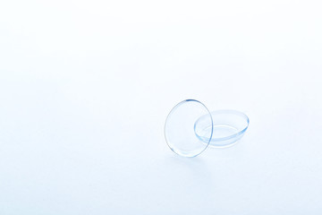Contact lenses on white background