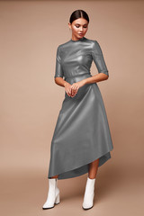 Sexy pretty fashion woman wear lather dress casual trend clothes collection catalogue  brunette...