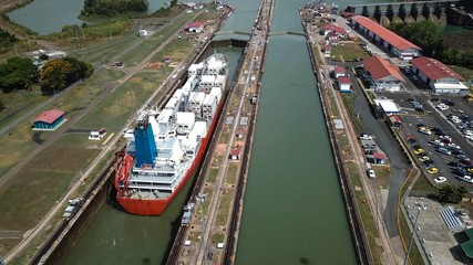 Aerial view of Panama channel - Miraflores locks - ship crossing the Panama Canal