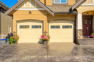 Luxury house with double garage door in Vancouver, Canada.