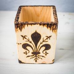 the ancient art of pyrography, wood and fire, the symbols of the city of Florence