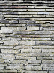 Simple stone wall texture. Graphic design background.