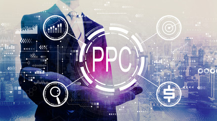 PPC - Pay per click concept with businessman on a city background