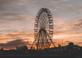 RETRO PHOTO FILTER EFFECT: Blackpool Central Pier at Sunset with Ferris Wheel, Lancashire, England UK