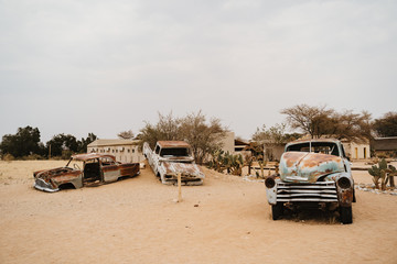 Old Timer Car Wrecks in a Desert Landscape in Solitaire, Namibia