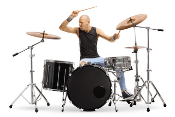 Bald man musician playing drums