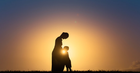 Pregnant mother and her little son welcoming a new baby to the world.  