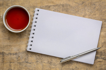 workspace flat lay with blank notebook